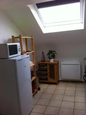 Cuisine ou kitchenette dans l'établissement Les 3 Tilleuls