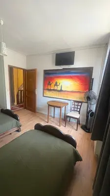 Télévision ou salle de divertissement dans l'établissement Chambre D'hôtes Anzi
