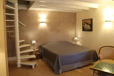 Un ou plusieurs lits dans un hébergement de l'établissement Côté Chambres