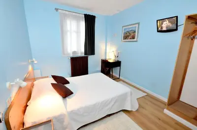 Un ou plusieurs lits dans un hébergement de l'établissement Hôtel de l'Ours