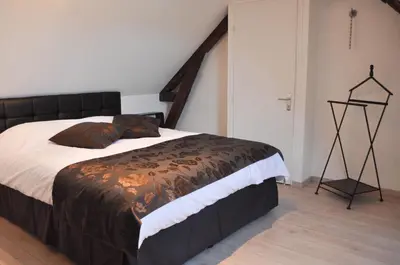 Un ou plusieurs lits dans un hébergement de l'établissement Le Clos Saint Martin