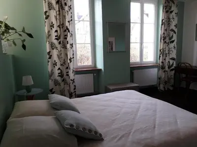 Un ou plusieurs lits dans un hébergement de l'établissement AMBIANCES chambres d 'hôtes