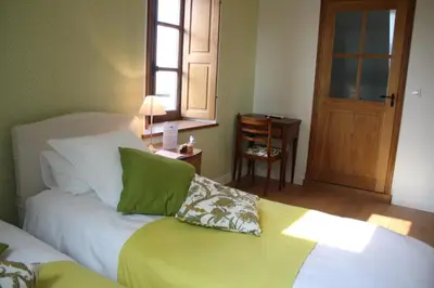 Un ou plusieurs lits dans un hébergement de l'établissement Orangerie Saint Martin