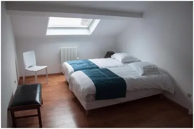 Un ou plusieurs lits dans un hébergement de l'établissement Hôtel Gambetta