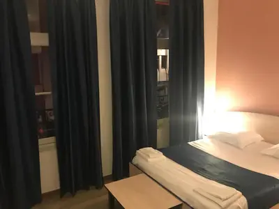 Un ou plusieurs lits dans un hébergement de l'établissement Hotel César Centre-ville Gare Charleville-Mézières