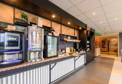 Cuisine ou kitchenette dans l'établissement B&B HOTEL Compiègne Thourotte