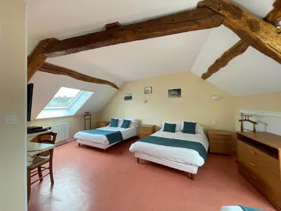 Un ou plusieurs lits dans un hébergement de l'établissement Auberge De L'Omois