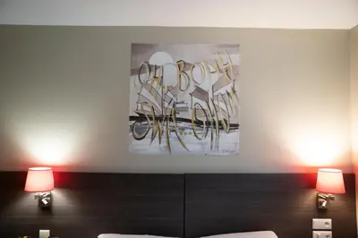 Un ou plusieurs lits dans un hébergement de l'établissement ibis Styles Compiegne