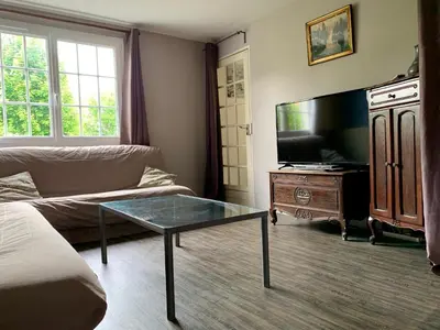 Télévision ou salle de divertissement dans l'établissement Chez Madame Titus