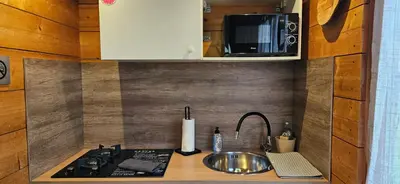 Cuisine ou kitchenette dans l'établissement Yourte 4 personnes proche Provins et Disney