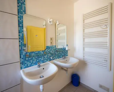 Salle de bains dans l'établissement Le Gîte de la Faïencerie