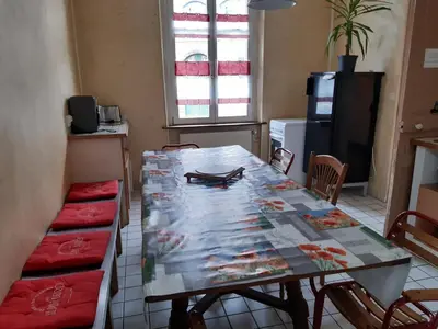 Télévision ou salle de divertissement dans l'établissement Gite 