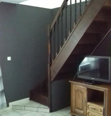 Télévision ou salle de divertissement dans l'établissement Gîte de la Py
