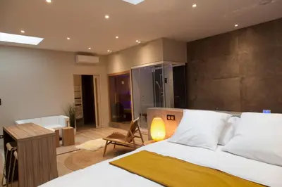 Un ou plusieurs lits dans un hébergement de l'établissement My Spa