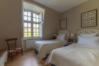 Un ou plusieurs lits dans un hébergement de l'établissement Le Château d'Etoges - Champagne