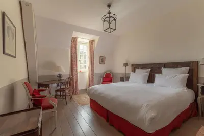 Un ou plusieurs lits dans un hébergement de l'établissement Le Château d'Etoges - Champagne