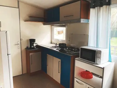 Cuisine ou kitchenette dans l'établissement L'auberge du moulin des prés