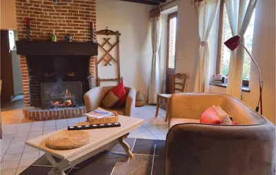 Coin salon dans l'établissement Two-Bedroom Holiday Home In Romery