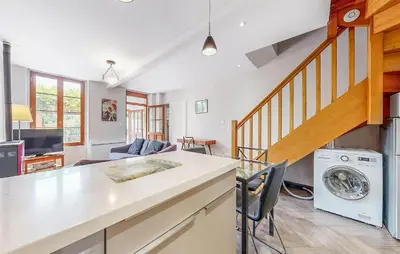 Coin salon dans l'établissement Apt B