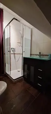 Salle de bains dans l'établissement Au Coin du Feu