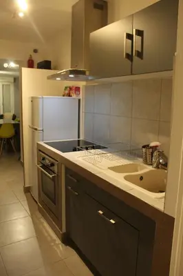 Cuisine ou kitchenette dans l'établissement Le Ch'ti Champenois