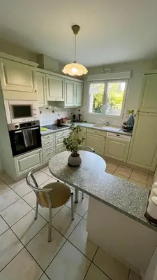 Cuisine ou kitchenette dans l'établissement Chez Delphine