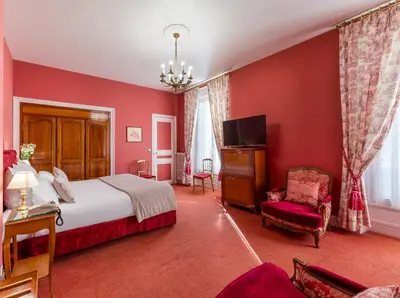 Un ou plusieurs lits dans un hébergement de l'établissement Grand Hôtel Des Templiers