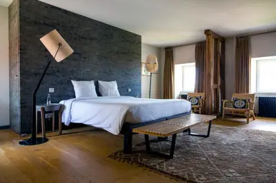 Un ou plusieurs lits dans un hébergement de l'établissement Ferme du Château