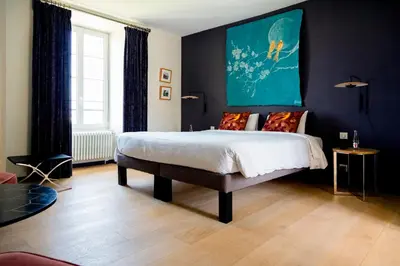 Un ou plusieurs lits dans un hébergement de l'établissement Ferme du Château