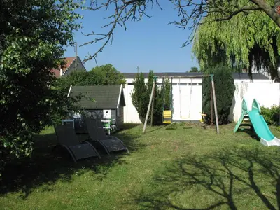 Jardin de l'établissement La Maison Des Chiens Rouges