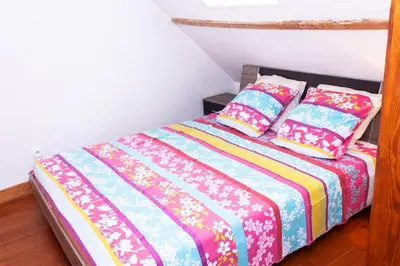 Un ou plusieurs lits dans un hébergement de l'établissement Maison de village Salency