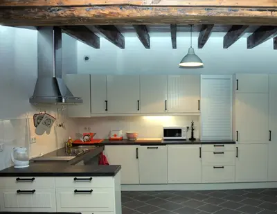 Cuisine ou kitchenette dans l'établissement La Grand Cour