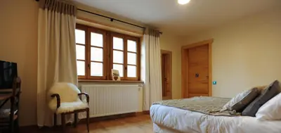 Un ou plusieurs lits dans un hébergement de l'établissement Auberge De L'abbaye