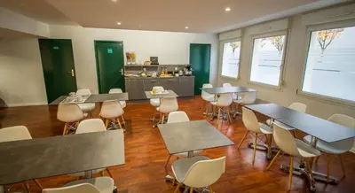 Restaurant ou autre lieu de restauration dans l'établissement KOSY Appart'hôtel Le Champ De Mars Reims
