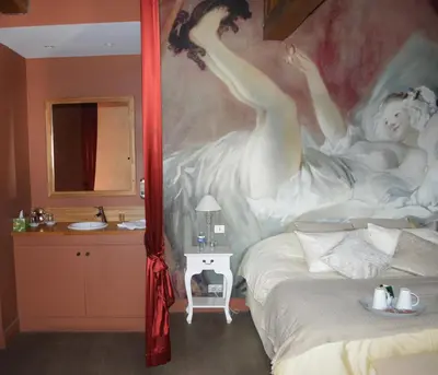 Un ou plusieurs lits dans un hébergement de l'établissement Le Clos Margot