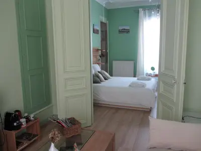 Un ou plusieurs lits dans un hébergement de l'établissement Chambre D'hôtes Les Epicuriens