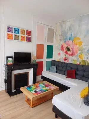 Télévision ou salle de divertissement dans l'établissement Chambre D'hôtes Les Epicuriens