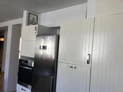Cuisine ou kitchenette dans l'établissement Chambre d'hôte-abc