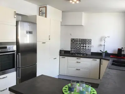 Cuisine ou kitchenette dans l'établissement Chambre d'hôte-abc