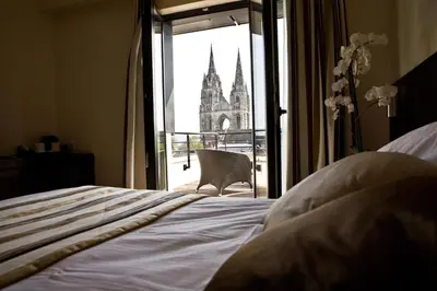 Un ou plusieurs lits dans un hébergement de l'établissement Best Western Plus Hotel des Francs