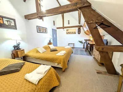 Un ou plusieurs lits dans un hébergement de l'établissement Chateau de Quesmy