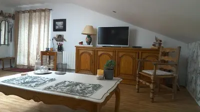 Télévision ou salle de divertissement dans l'établissement Chambre d'hôtes de Marie