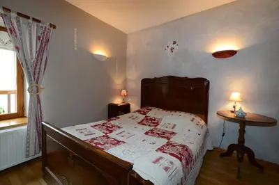 Un ou plusieurs lits dans un hébergement de l'établissement Chambres d'hôtes L'Hirondelle