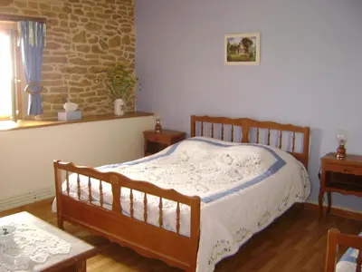 Un ou plusieurs lits dans un hébergement de l'établissement Chambres d'hôtes L'Hirondelle