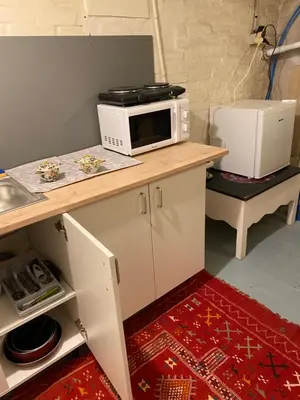 Cuisine ou kitchenette dans l'établissement Chez MARTINE