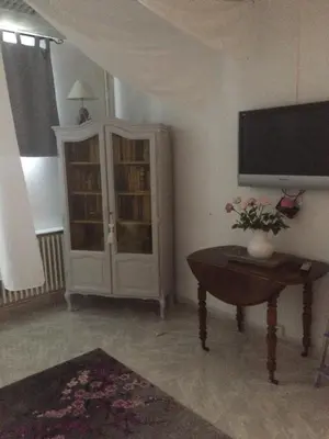 Télévision ou salle de divertissement dans l'établissement Chez MARTINE