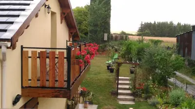 Jardin de l'établissement Gite Au Grenier Cosy