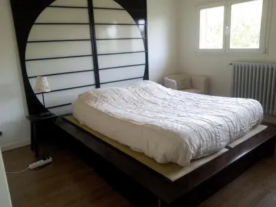Un ou plusieurs lits dans un hébergement de l'établissement Villa - Coulommiers - Parcs des félins - Provins