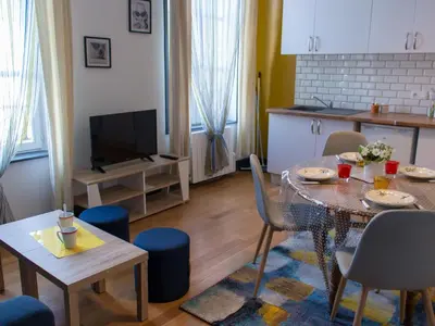 Télévision ou salle de divertissement dans l'établissement Trankil Apparts centre