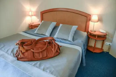 Un ou plusieurs lits dans un hébergement de l'établissement Nicey - Hôtel Spa, Lounge, Coworking
